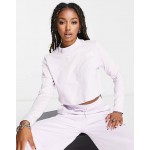The North Face Nekku high neck cropped long sleeve top in lilac Exclusive at ASOS