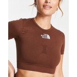 The North Face Training seamless performance cropped t-shirt in brown Exclusive at ASOS