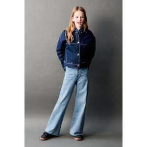 Jeans with adjustable interior waistband and front button closure. Back patch pockets.