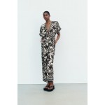 PRINTED BELTED JUMPSUIT