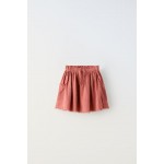 TEXTURED MESH POCKET SKIRT