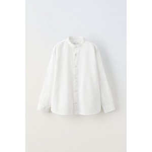 Long sleeve banded collar shirt. Front button closure. Fabric is 77% cotton and 23% linen.