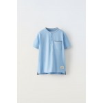 STRUCTURED PIQUEE POCKET POLO SHIRT