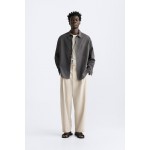 RELAXED FIT PLEATED PANTS