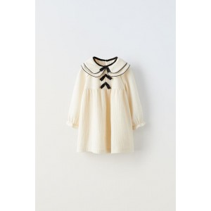 CONTRASTING COLLAR PIPING AND BOWS DRESS