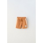 CONTRASTING LABEL TERRYCLOTH SHORTS