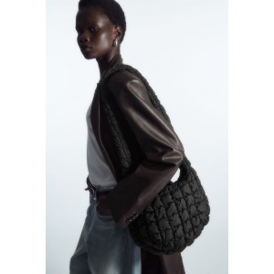 QUILTED MESSENGER